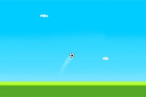 Piłka nożna unosząca się w powietrzu na tle jasnego, niebieskiego nieba z małymi chmurkami i zieloną trawą na dole