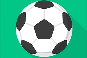 Piłka nożna z czarnymi i białymi panelami na zielonym tle