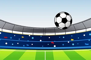 Piłka nożna unosząca się nad zielonym boiskiem na tle trybun stadionu
