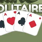 Cztery asy kart do gry w różnych kolorach na tle napisu