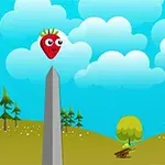 Truskawka z oczami na szczycie szarego obelisku na tle zielonego krajobrazu z drzewami i niebieskim, zachmurzonym niebem