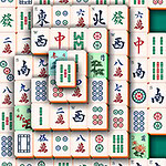 Stos płytek zdobionych różnymi symbolami na zielonym tle