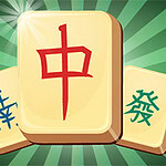 Trzy płytki z chińskimi znakami na promienistym zielonym tle