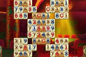 Kafelki z numerami i literami ułożone w układzie na tle wnętrza z ciepłym oświetleniem i czerwonymi krzesłami