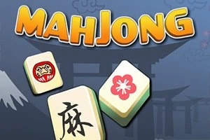 Napisy MAHJONG z kafelkami symboli na tle japońskiej bramy torii