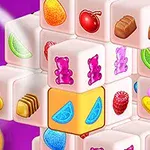 Układ trójwymiarowych białych klocków z kolorowymi rysunkami owoców, słodyczy i przekąsek na fioletowym tle