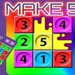 Kolorowa siatka 3x3 z liczbami wewnątrz, otoczona różnokolorową ramką, z widocznym napisem „MAKE 5” na górze