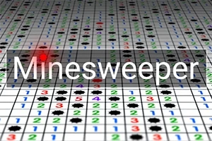 Plansza z polami oznaczonymi cyframi i ikonami min, z nałożonym napisem Minesweeper
