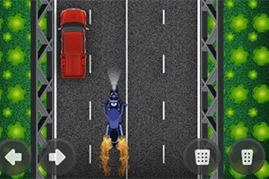 Motocykl jadący na drodze obok czerwonego samochodu z widocznymi ikonami strzałek sterujących i zielonych drzew po bokach