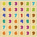 Kolorowe cyfry od 1 do 9 na kwadratowych kafelkach ułożone w siatkę