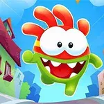 Kolorowy potworek z dużymi oczami i czerwonymi włosami, biegnący ulicą pomiędzy bajkowymi domami