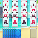 Kobieta w hawajskim stroju stoi na plaży obok ułożonych kart, a w tle widać górzystą wyspę