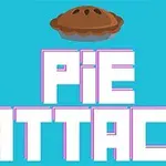 Niebieskie tło z dużym napisem PIE ATTACK oraz latającym brązowym ciastem na górze