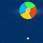 Kolorowe, czteroczęściowe koło na niebieskim tle z małym żółtym okręgiem poniżej