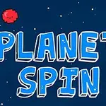 Niebieski napis PLANET SPIN na kosmicznym tle z zieloną i czerwoną kuleczką