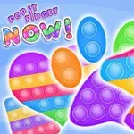 Kolorowe silikonowe pop-it w kształcie jednorożca z napisem Pop It Fidget Now na niebieskim tle