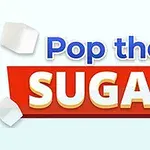 Napis Pop the Sugar na czerwonym tle z kostkami cukru wokół