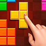 Kolorowe klocki układane na planszy w różne kształty, z ręką wskazującą na żółty klocek