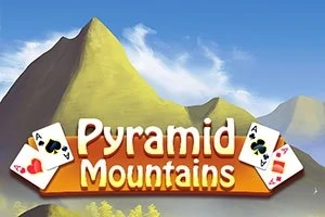 Góry z napisem Pyramid Mountains na tle nieba, otoczone kartami do gry