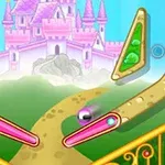 Różowy zamek na wzgórzu z wiatrakami i piłeczką na ścieżce między kolorowymi bumperami