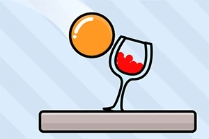 Pomarańczowa piłka w powietrzu tuż nad kieliszkiem z czerwonym płynem, stojącym na platformie