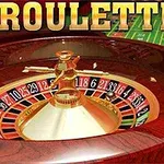 Stół do ruletki z widocznym kołem i bilami, na tle zielonego filcu do gry, z napisem ROULETTE 3D u góry
