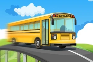 Żółty szkolny autobus jadący po krętej drodze na tle błękitnego nieba z białymi chmurami