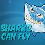 Uśmiechnięty rysunkowy rekin na niebieskim tle z napisem Sharks Can Fly