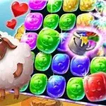 Owca obok planszy z kolorowymi, błyszczącymi klockami i magicznym wiadrem, otoczona sercami i gwiazdkami