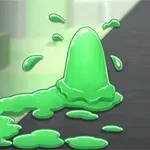 Zielony kleks rozpryskujący się na czarnej powierzchni