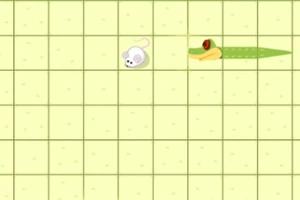 Biała mysz i zielony wąż na żółtej siatce