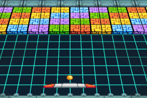 Kolorowe bloki ułożone w rzędach na tle siatki z platformą i piłką na dole obrazu