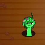 Zielona postać z kwiatową ozdobą na głowie wyłania się z otworu na brązowym tle