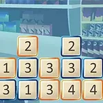 Klocki z cyframi ułożone w rzędach na tle sklepowych półek