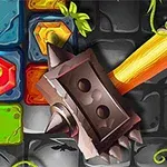 Kolorowe heksagonalne i kwadratowe płytki na kamiennej powierzchni oraz młot z drewnianą rączką i metalową głowicą