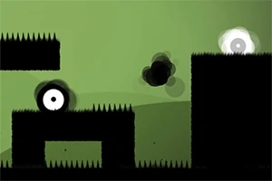 Czarno-białe kształty na zielonym tle z kolcami i okrągłymi obiektami