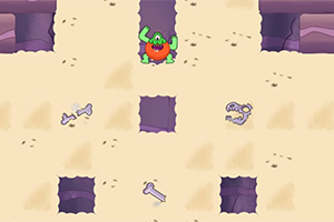 Zielony potwór na żółtym pustynnym tle z kośćmi i wydrążonymi tunelami