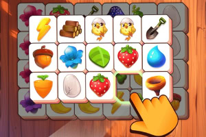 Ikony przedstawiające różne przedmioty, takie jak błyskawica, pisklęta, truskawki i narzędzia, z ręką wskazującą jeden element na drewnianym tle