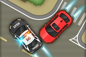 Radiowóz policyjny ściga czerwony samochód sportowy na skrzyżowaniu