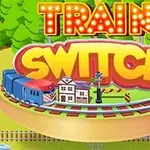 Kolorowa grafika przedstawiająca napis Train Switch z pociągiem i budynkiem na torach, otoczona drzewami