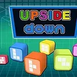 Kolorowe, neonowe litery Upside Down na tle gridu 3D z różnokolorowymi klockami w stylu retro