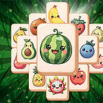 Stos kart z uśmiechniętymi, kreskówkowymi owocami na zielonym tle