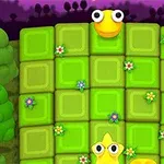 Żółta postać z oczami na zielonej planszy z kwiatami, otoczona drzewami na tle fioletowego nieba