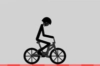 Musi jechać rowerem na jednym kole jako wyzwanie