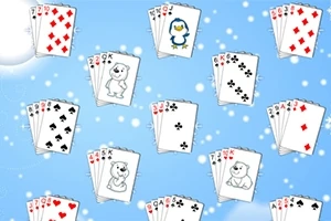 Różne karty do gry z ilustracjami pingwinów i niedźwiedzi na niebieskim tle z białymi kropkami