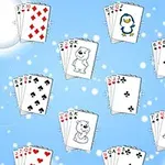 Różne karty do gry z ilustracjami pingwinów i niedźwiedzi na niebieskim tle z białymi kropkami