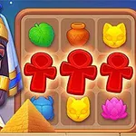 Postać kobiety w stylu starożytnego Egiptu obok planszy z kolorowymi symbolami, takimi jak figury ludzików, liść, dzban, kot i lotos