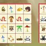 Karty z obrazkami przedstawiające różne zwierzęta, rośliny i przedmioty w dwóch kolumnach na jasnym tle