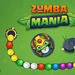 Żaba celująca kolorową kulką w ciągu kolorowych kulek na zielonym tle z napisem Zumba Mania